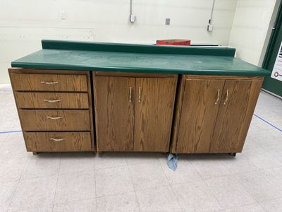 Three Cabinets And Countertop