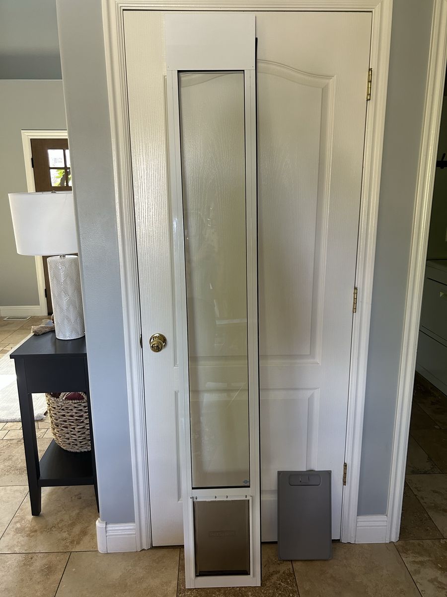 Dog door for sliding glass door