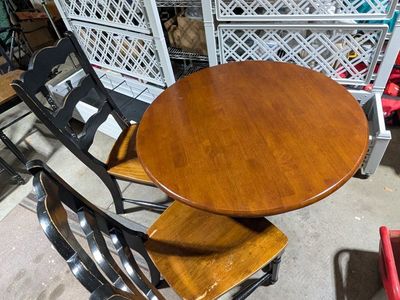 Round wood table with chairs