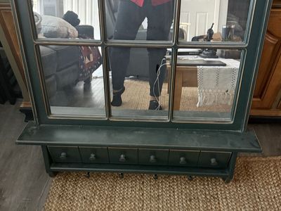 Mirror coat hanger