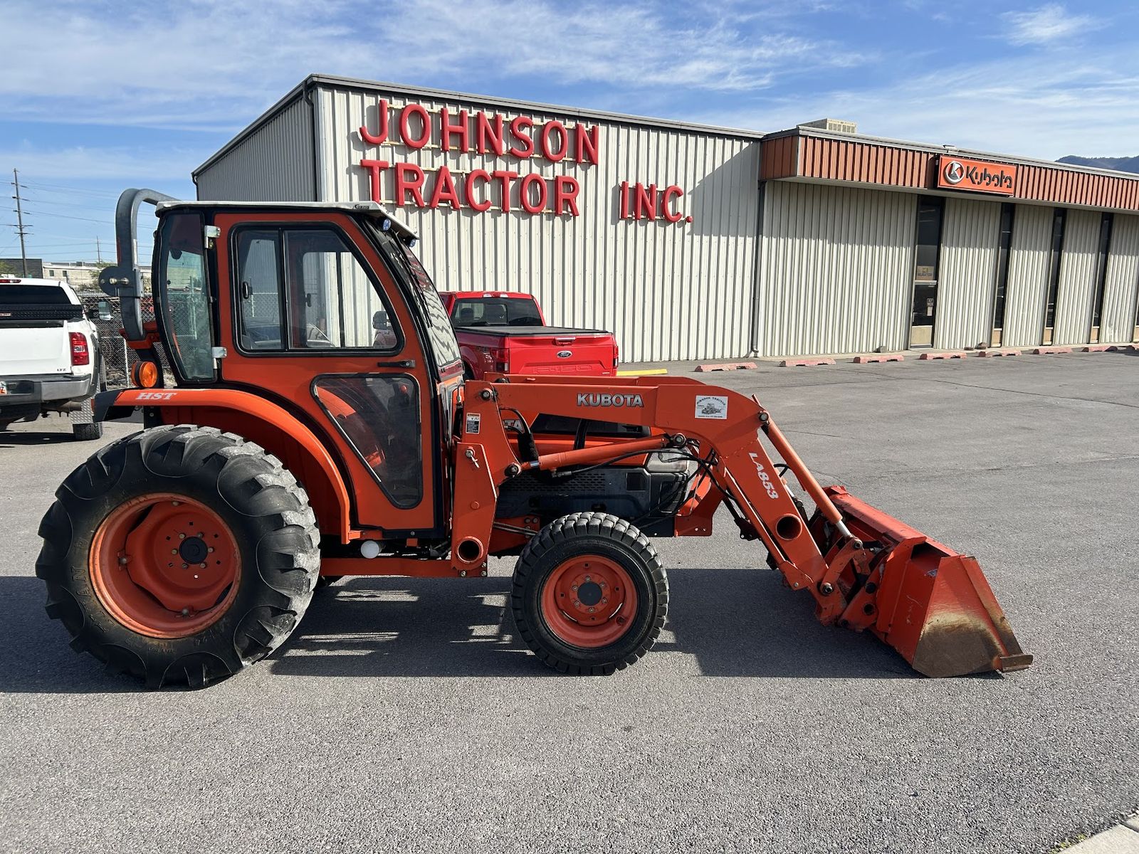 Kubota L4630 HST with Cab, Loader Bucket, & Snow Pusher