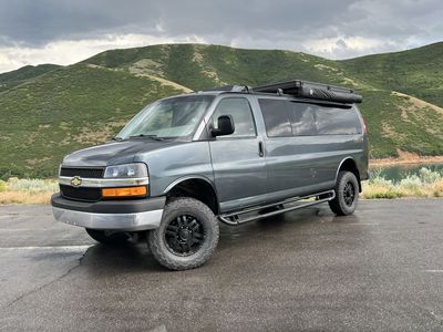 2014 Quigley 4x4 Chevrolet Express 3500 sleeps 4 seats 9 Rooftop Tent