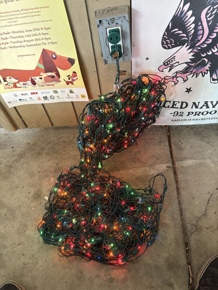 Christmas lights, ornaments, decorations, and wrapping paper bundle