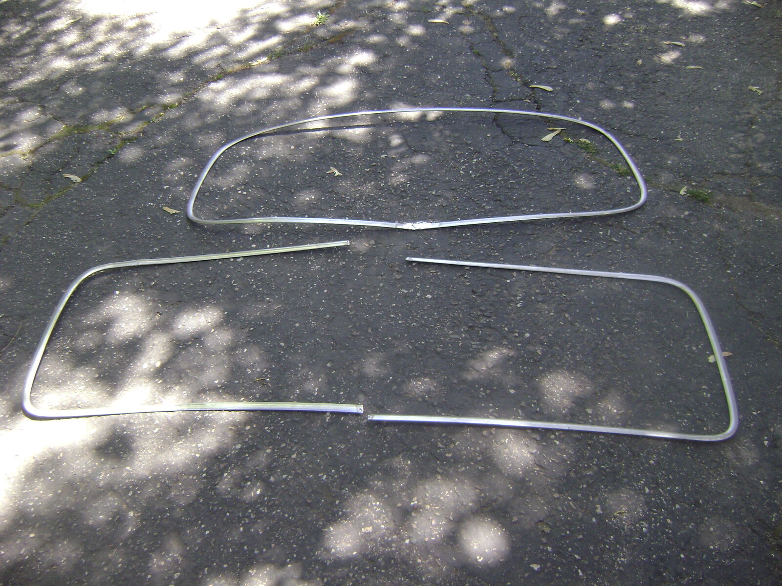 1949 and 1950 ford front and rear stainless  windshield trim