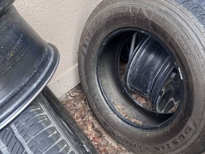 Firestone Destination Tires P265/75R16 with Black Steel Rims - Set of 4
