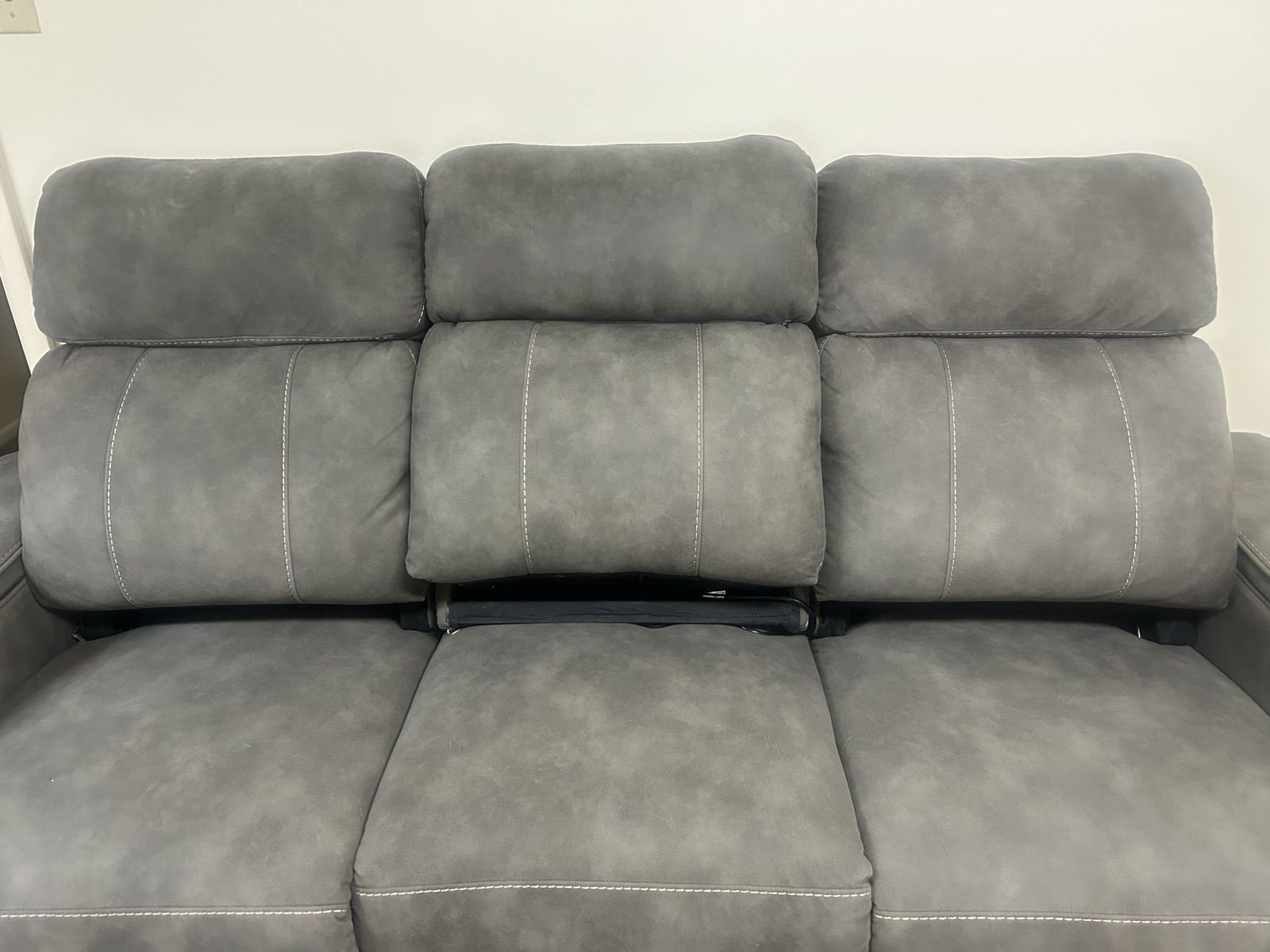 Power Reclining sofa with pull down table