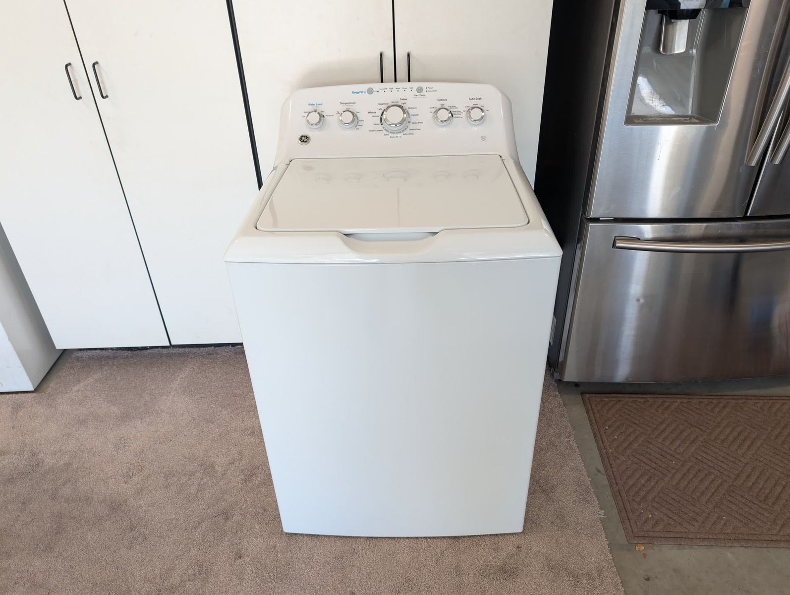 Well Maintained GE Washer Model GTW465ASN9WW Top Load Washing Machine