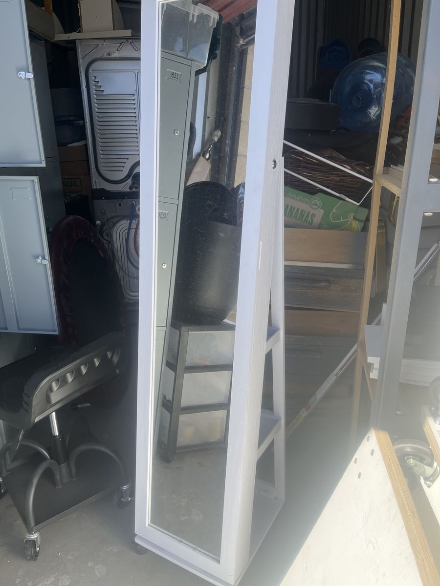 Narrow Freestanding Mirror with jewelry or makeup storage