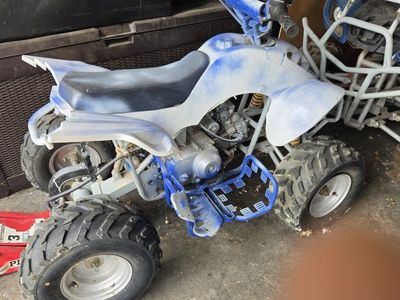Used 4-Wheeler ATV in Blue and White
