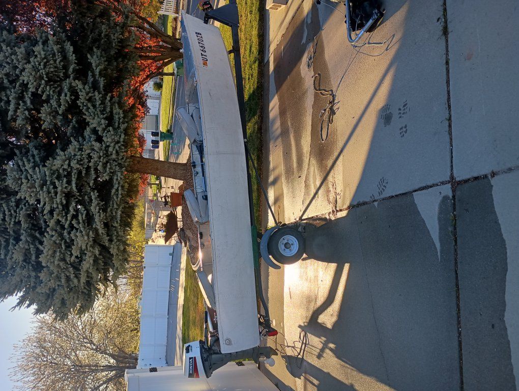 14 foot fishing boat with two motors and trailer