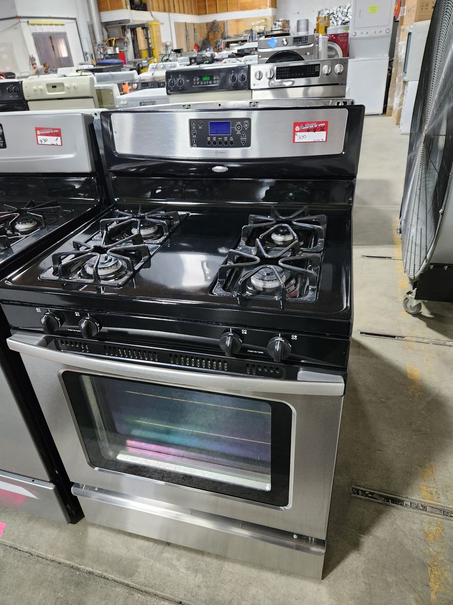 Whirlpool Stainless Steel Gas Range Oven with 4 Burners, Digital Display, and Storage Drawer