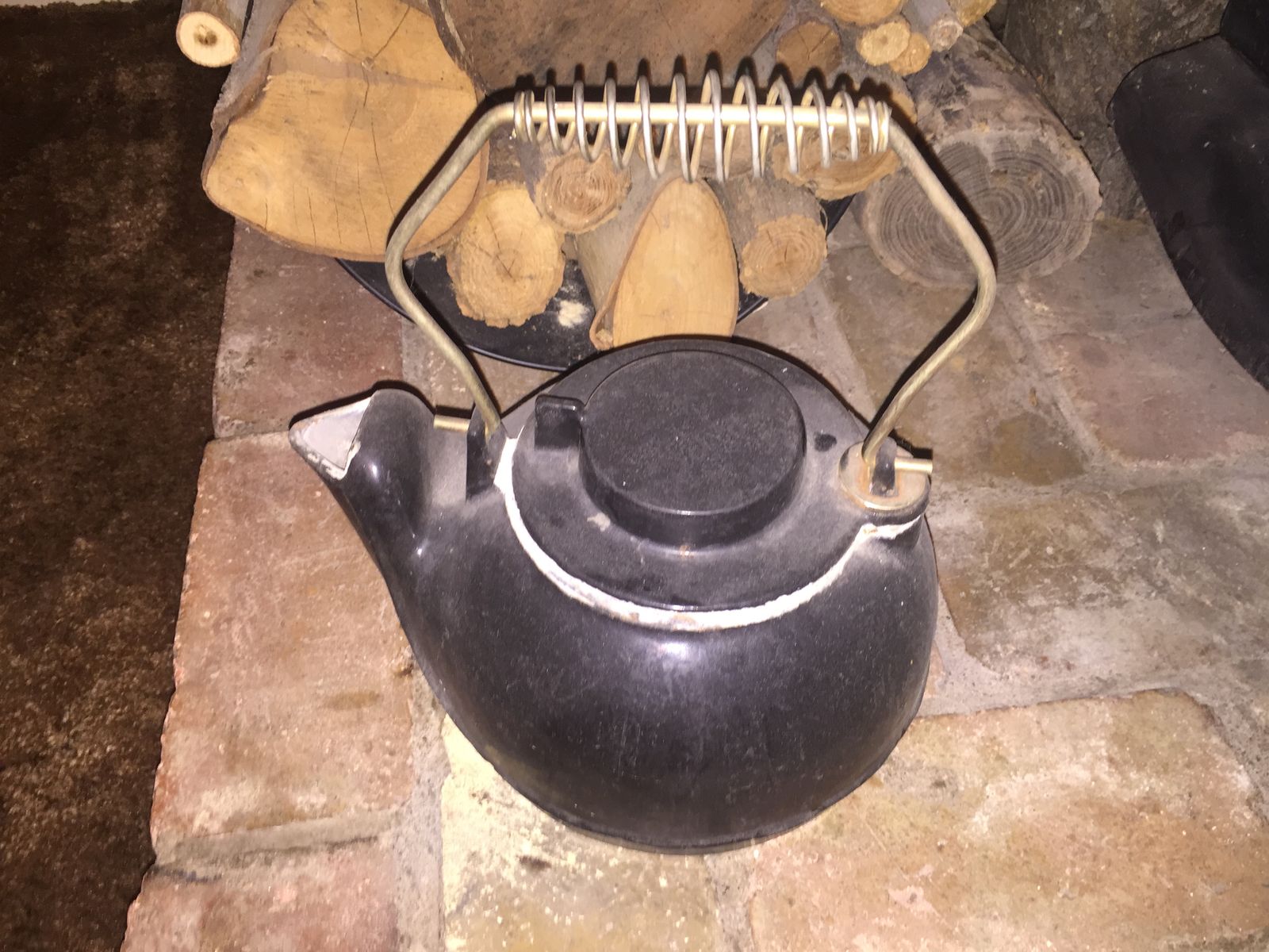 Vintage Black Enameled Cast Iron Tea Kettle with Wire Coil Handle