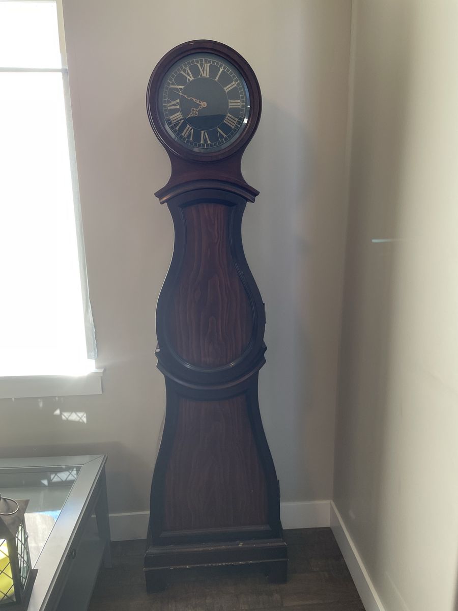 Bombay decorative grandfather clock with storage. 
