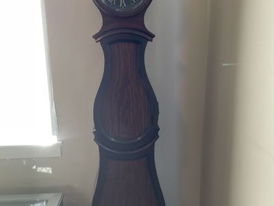 Bombay decorative grandfather clock with storage.