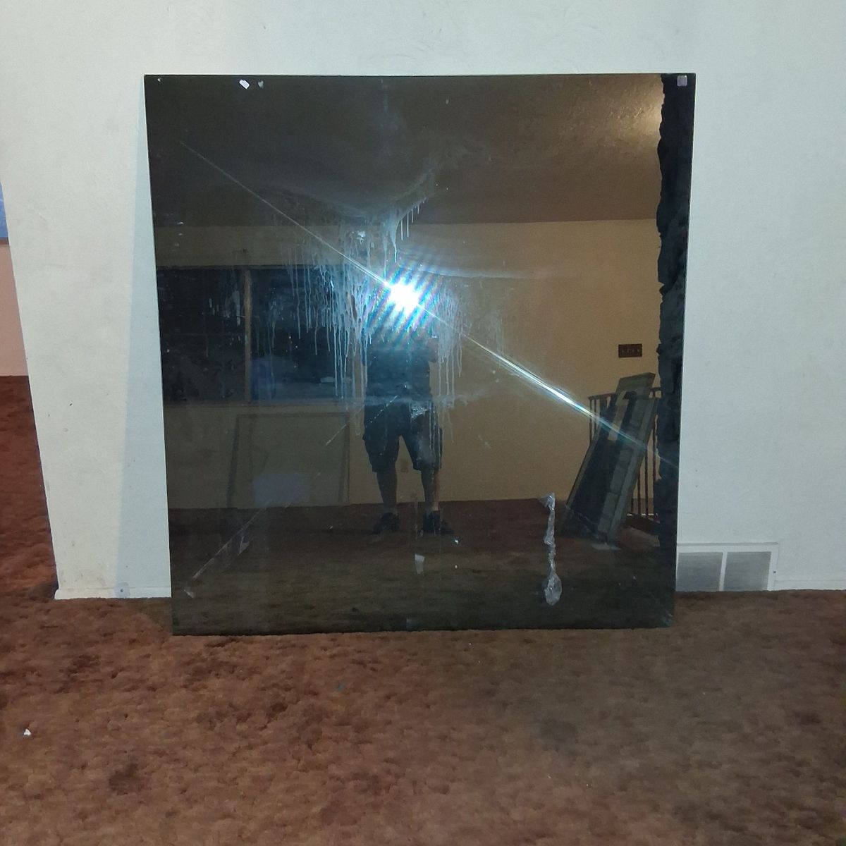 large tinted mirror