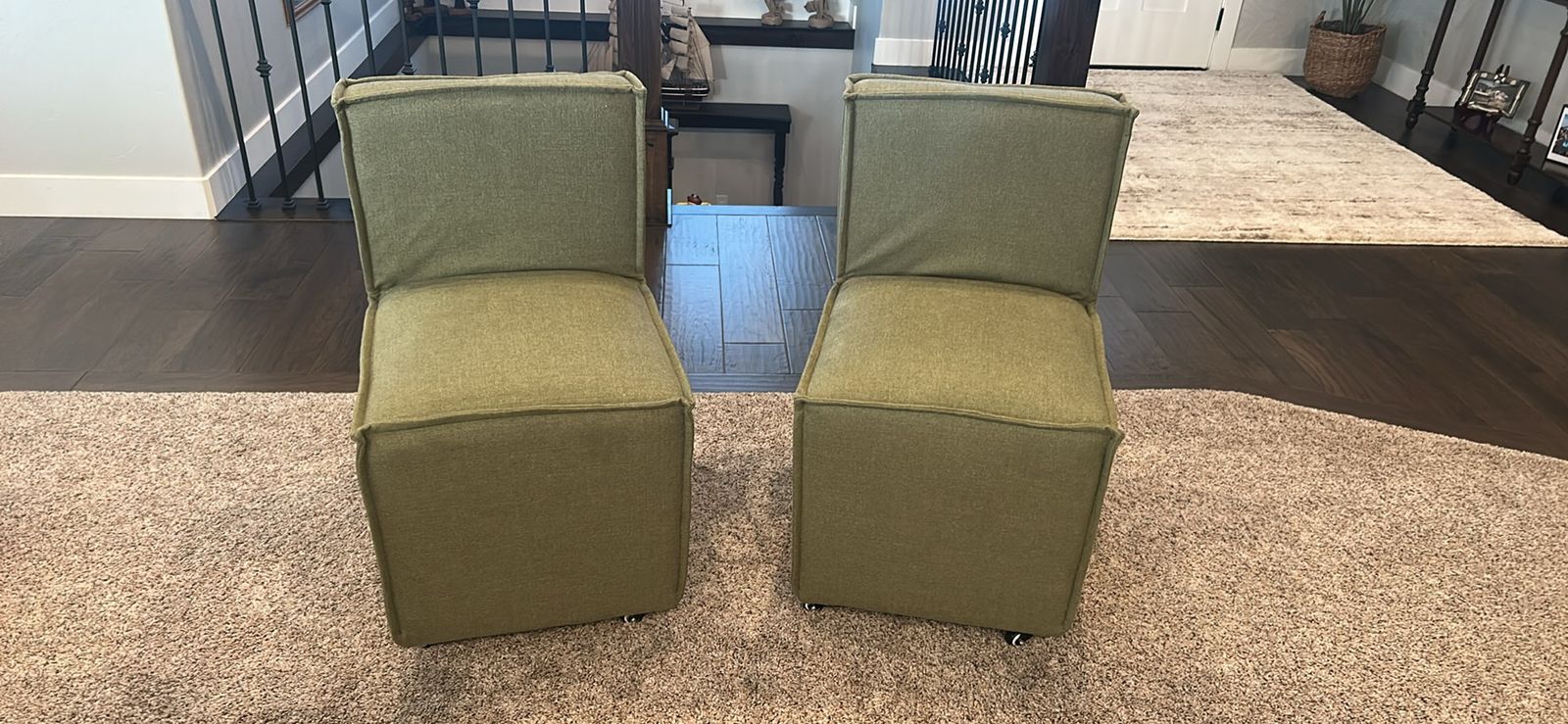 Pair of Modern Green Upholstered Armless Accent Chairs on Wheels