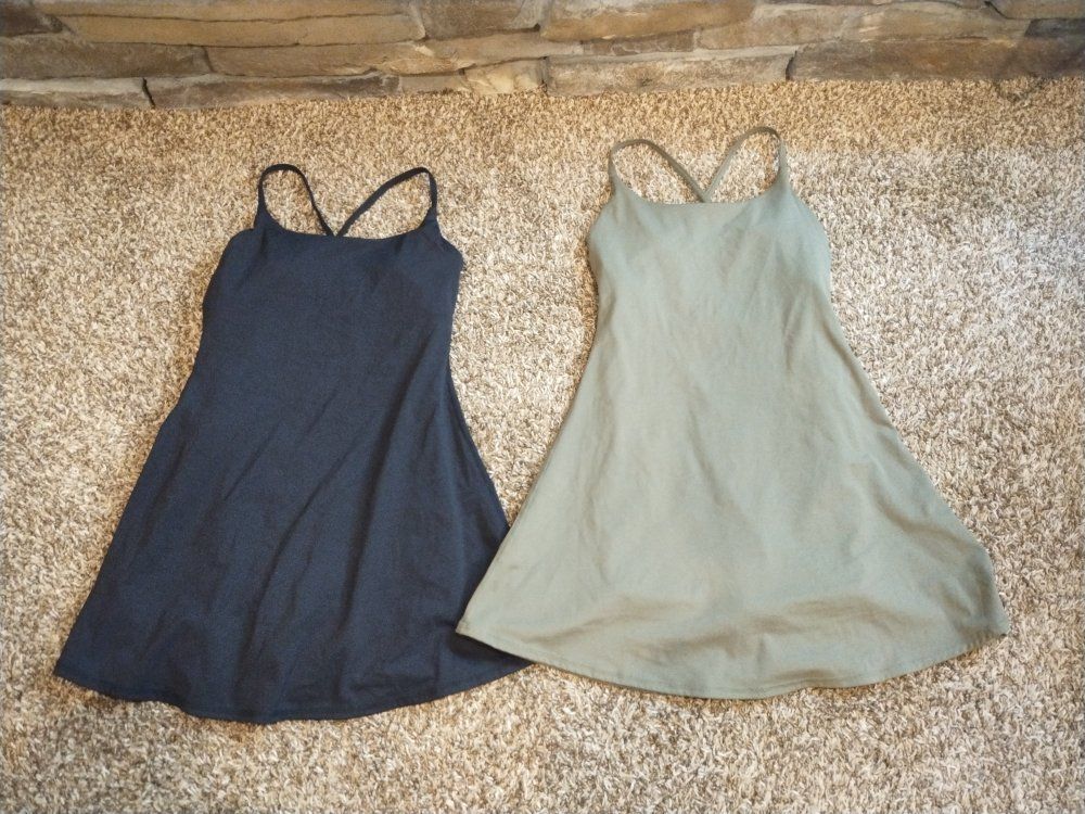 Two Athletic Wear Dresses Featuring Built-In Shorts And Bra