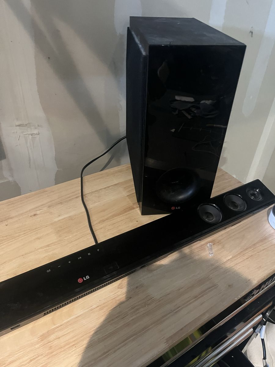LG Sound Bar + Wireless Subwoofer + Optical Cable