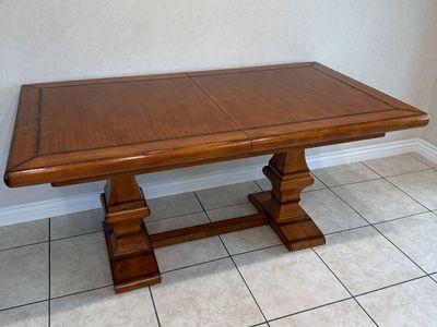 Solid Wooden Dining Table with Double Pedestal Base and Extendable Leaf