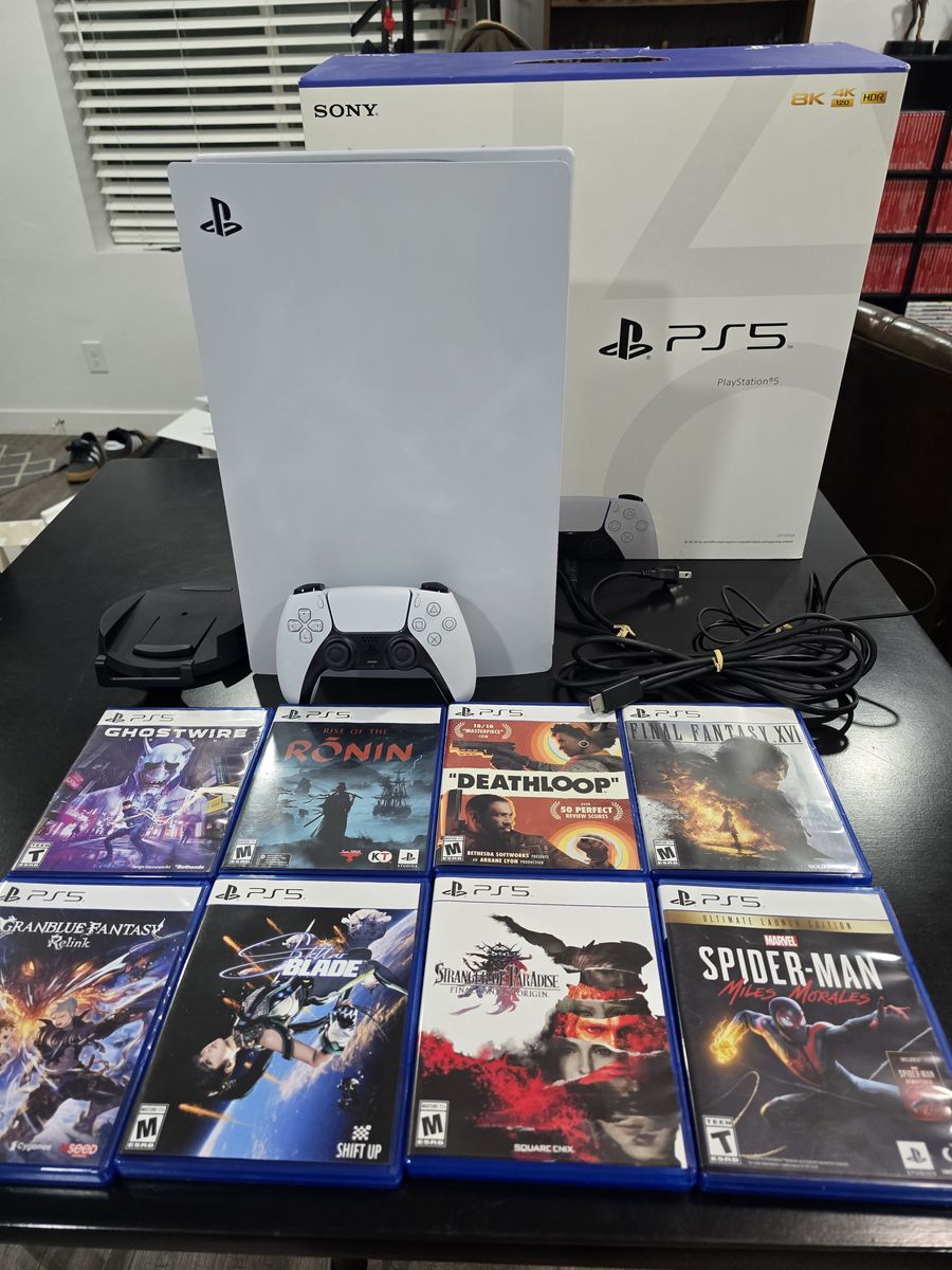 Playstation 5 w/ Brand new controller and 8 games
