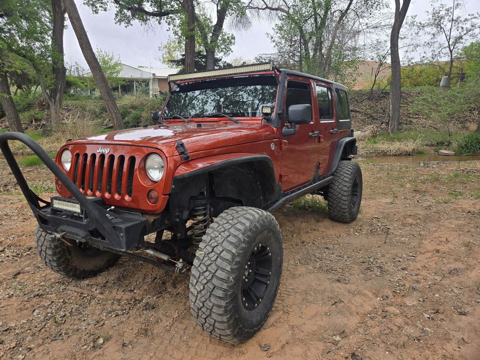 Wrangler JKU on 37s Winch ARB locker
