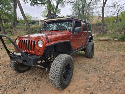 Wrangler JKU on 37s Winch ARB locker