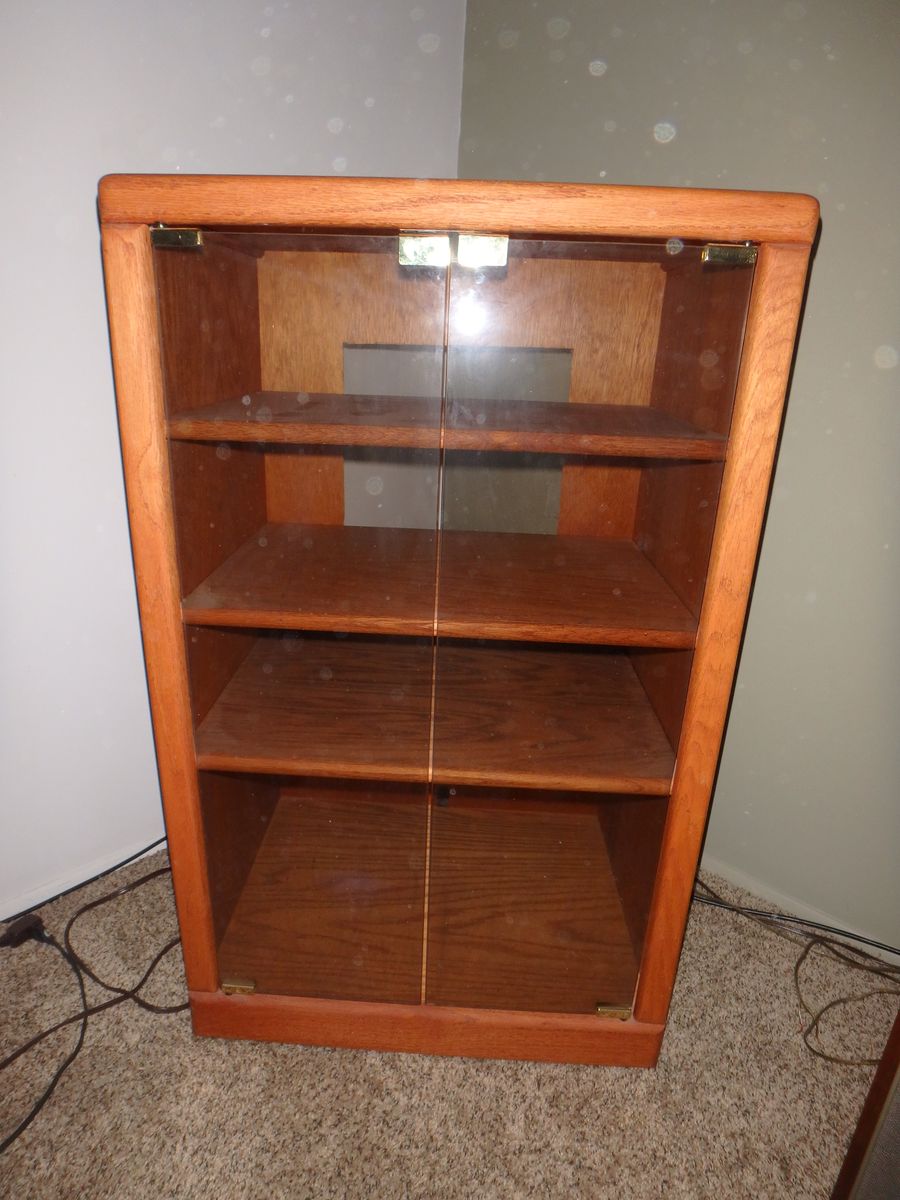 Oak stereo cabinet with glass doors