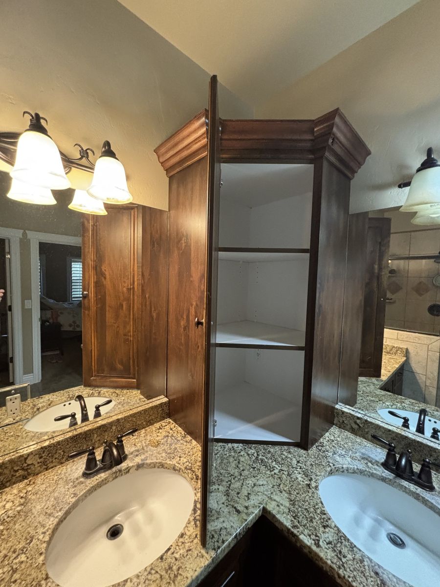 Primary Bathroom Corner Alder Cabinets.