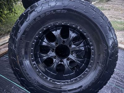 Nitto Terra Grappler All Terrain Tires with Black Rims Set of 4