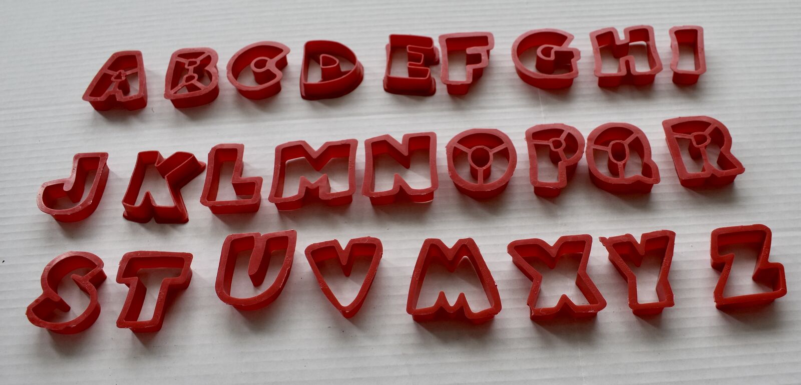 26 Assorted Red Plastic Alphabet Cookie Cutters In New Condition