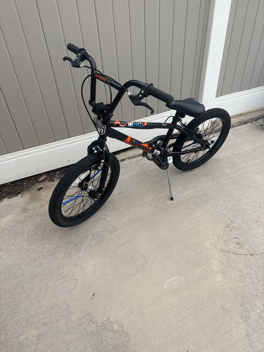 Mongoose 18 inch Switch BMX Bike - Black with Orange Accents, Kickstand.
