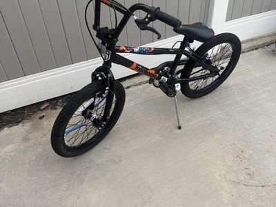 Mongoose 18 inch Switch BMX Bike - Black with Orange Accents, Kickstand.