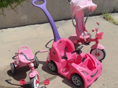 Radio flyer tricycles or step 2 pink car