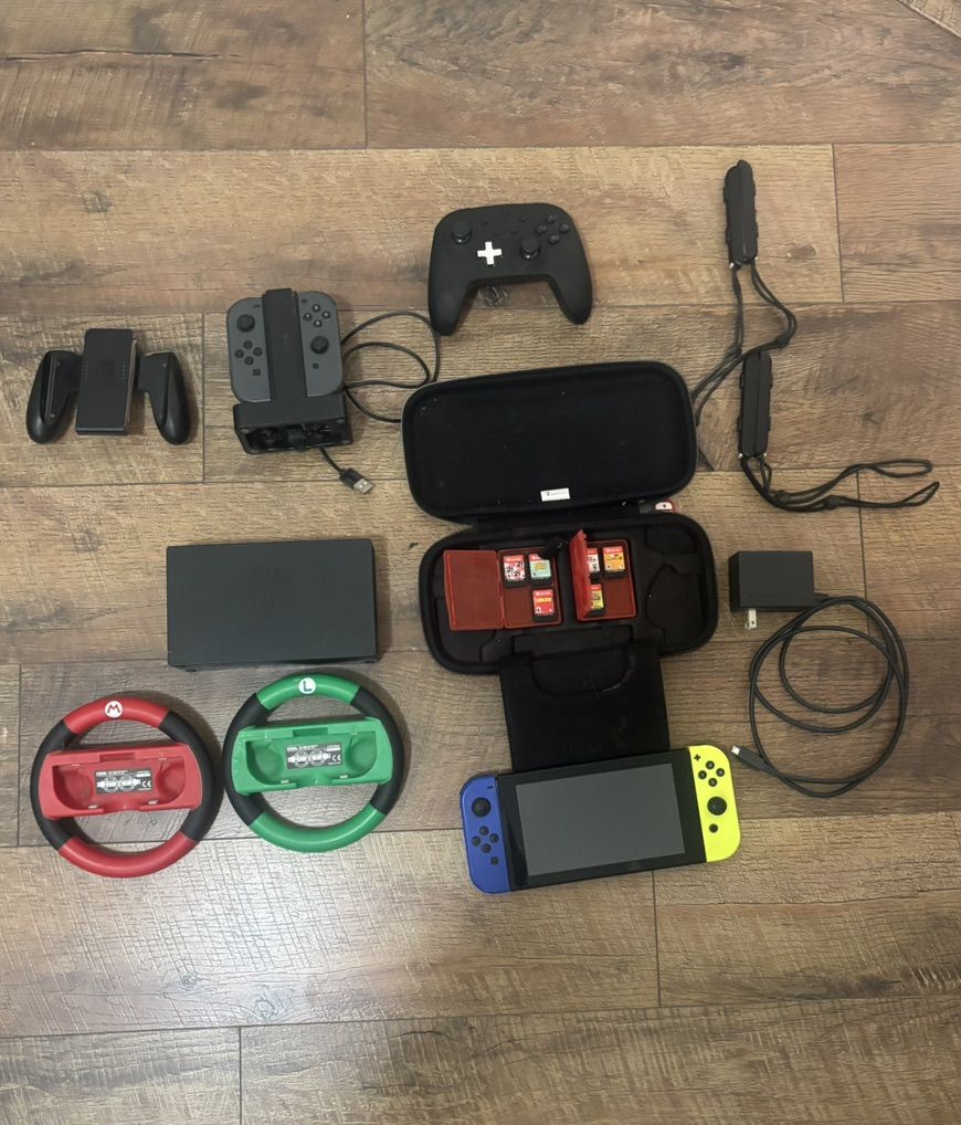 Nintendo Switch with extra accessories and games