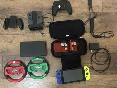 Nintendo Switch with extra accessories and games