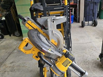Dewalt 15 Amp Corded 12 in. Double Bevel Sliding Compound Miter Saw with rolling stand