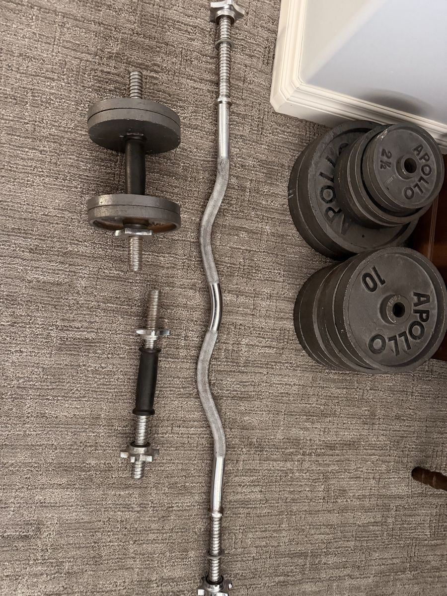 Curling bar, dumb bell bars and 145 lbs in weights