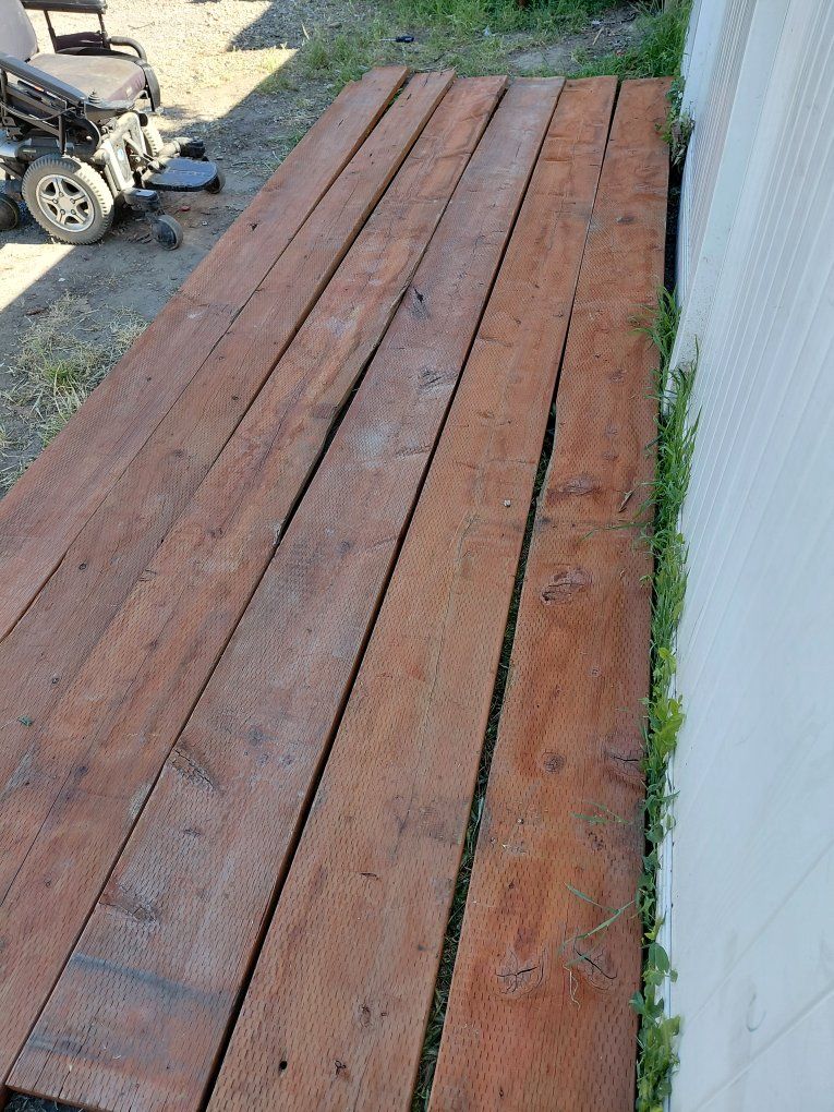 treated 2x12s and 2x10s 16 footers