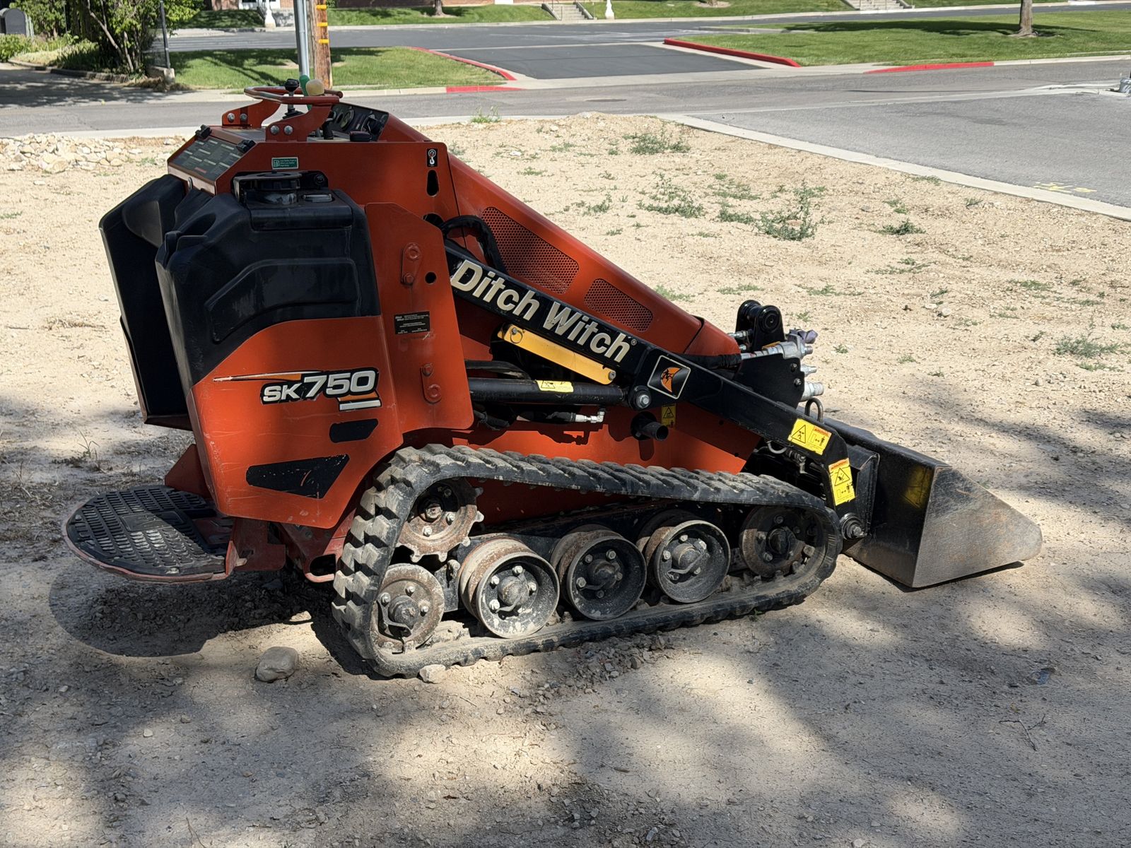 Ditch Witch SK750 Mini Skid Steer Track Loader with Bucket and Excavator