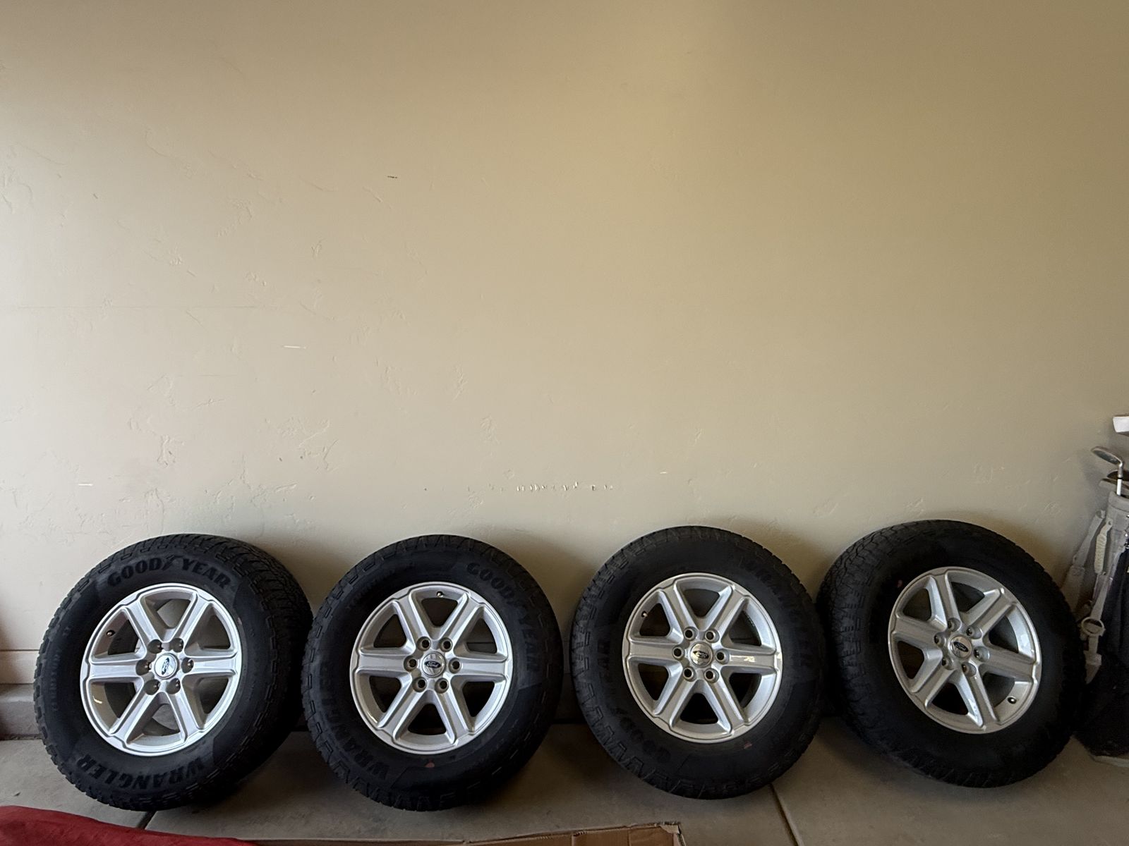 4 Wheels and Tires- Goodyear Wrangler Territory AT 275/65R18