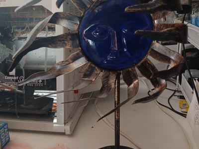 Natural Wonders Vintage Sun Face Metal Candle Holder Tabletop Decor Blue Glass