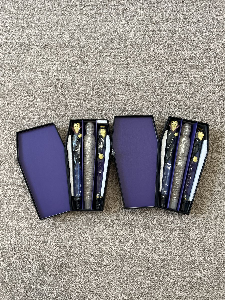 2  new in box sets of Halloween candles in “coffin” box
