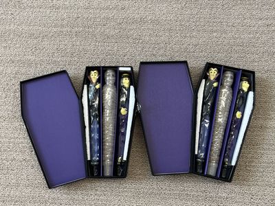 2 new in box sets of Halloween candles in “coffin” box