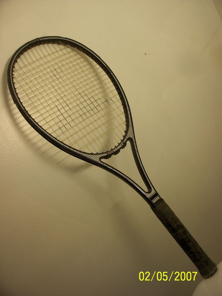 Kennex Pro Tennis Racquet (racket).  Location: near REI