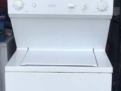 Large capacity GE stackable washer and dryer in great condition. Includes free delivery !