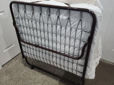 FOLDING PORTABLE TWIN BED w/ MATTRESS ON WHEELS CLEAN & USED ONCE FOR GUESTS & SMALL SPACES