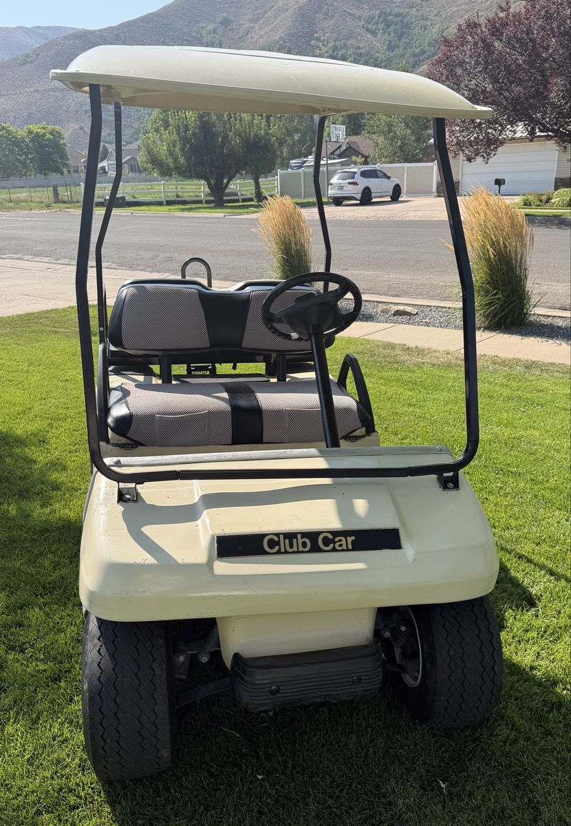 Club Car Golf Cart with Roof Top and Rear Bench Seat - Beige