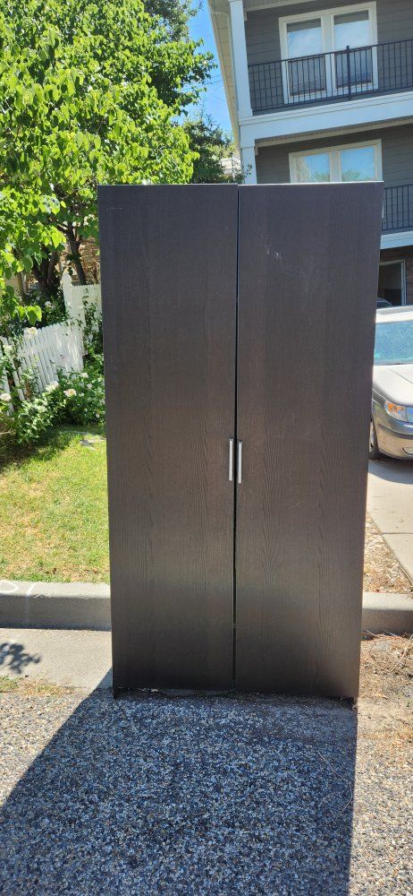 FREE  -   IKEA Brimnes Wardrobe Black Tall Two-Door Closet w/ Hanging Rod & Shelves