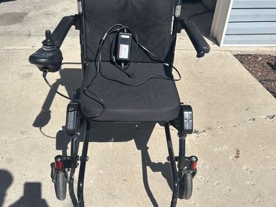 Electric collapsing wheelchair