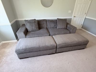 Gray Sofa and Storage Ottomans